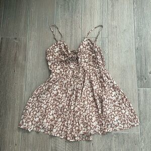 super cute size L mauve and cream floral romper from Baevely